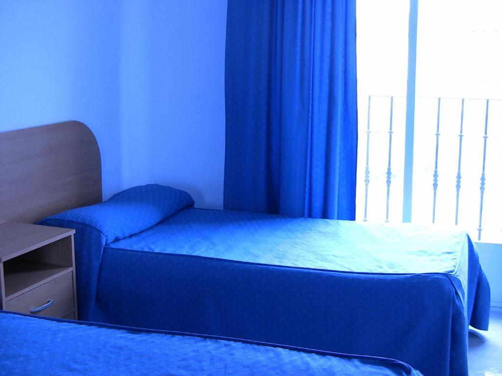 Apartahotel Los Hermanos Ocaña Habitación foto